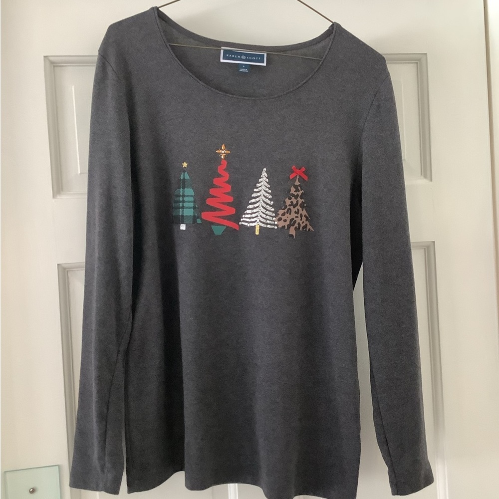 Ladies grey top with Christmas trees on front.